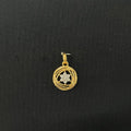 0.16 carat round diamond locket in 14K gold on black background
