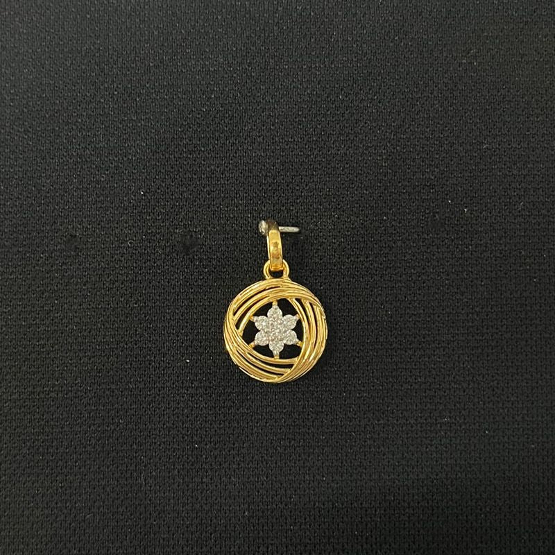 0.16 carat round diamond locket in 14K gold on black background
