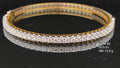 5.01 carat lab grown diamond line bangle in 18K yellow gold with 70 diamonds set all the way round