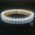 16.77 carat round shaped diamond bangle in 14K gold on black background
