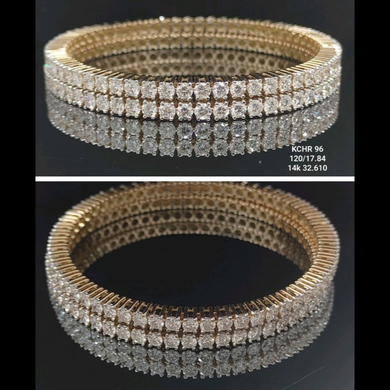 17.84 carat round shaped diamond bangle in 18K gold on black background
