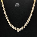 Long gold necklace with diamond embellishments 14K on black background
