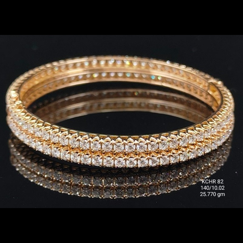 5.01 carat round shaped diamond bangle in 18K gold on black background
