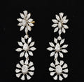 7.43 carat small round diamond necklace earring set in 14K gold on black background
