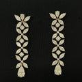 Gold necklace and earring set with large diamond stones 14K on black background
