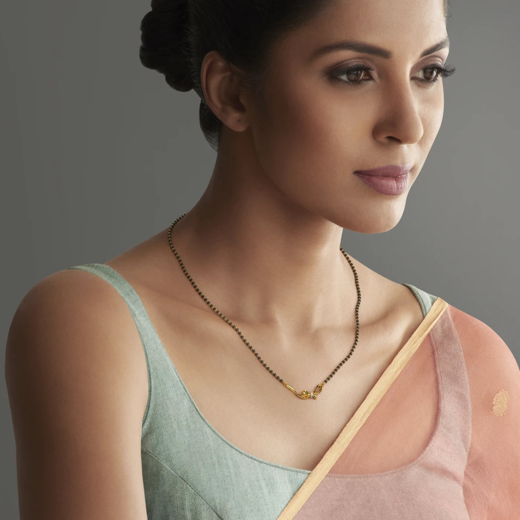 0.026 Ct Round mangalsutra with Purity of 18Kt