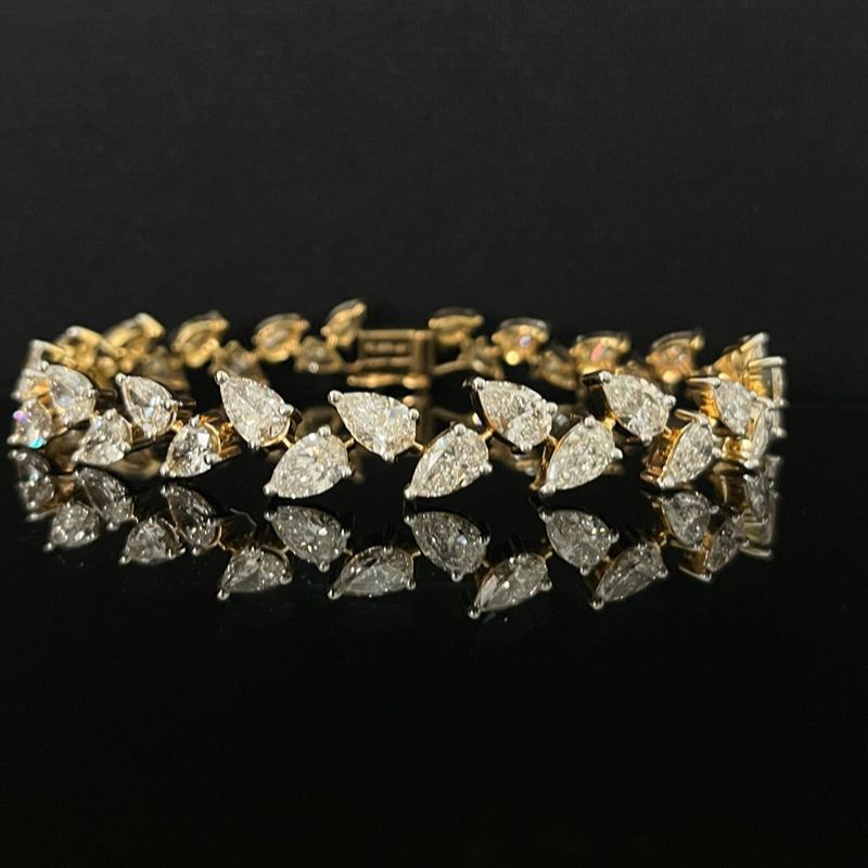10.85 carat fancy shaped lab-grown diamond bracelet in 18kt gold, front view
