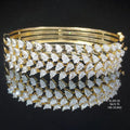 5.73 carat fancy shaped lab-grown diamond bracelet in 18kt gold, front view
