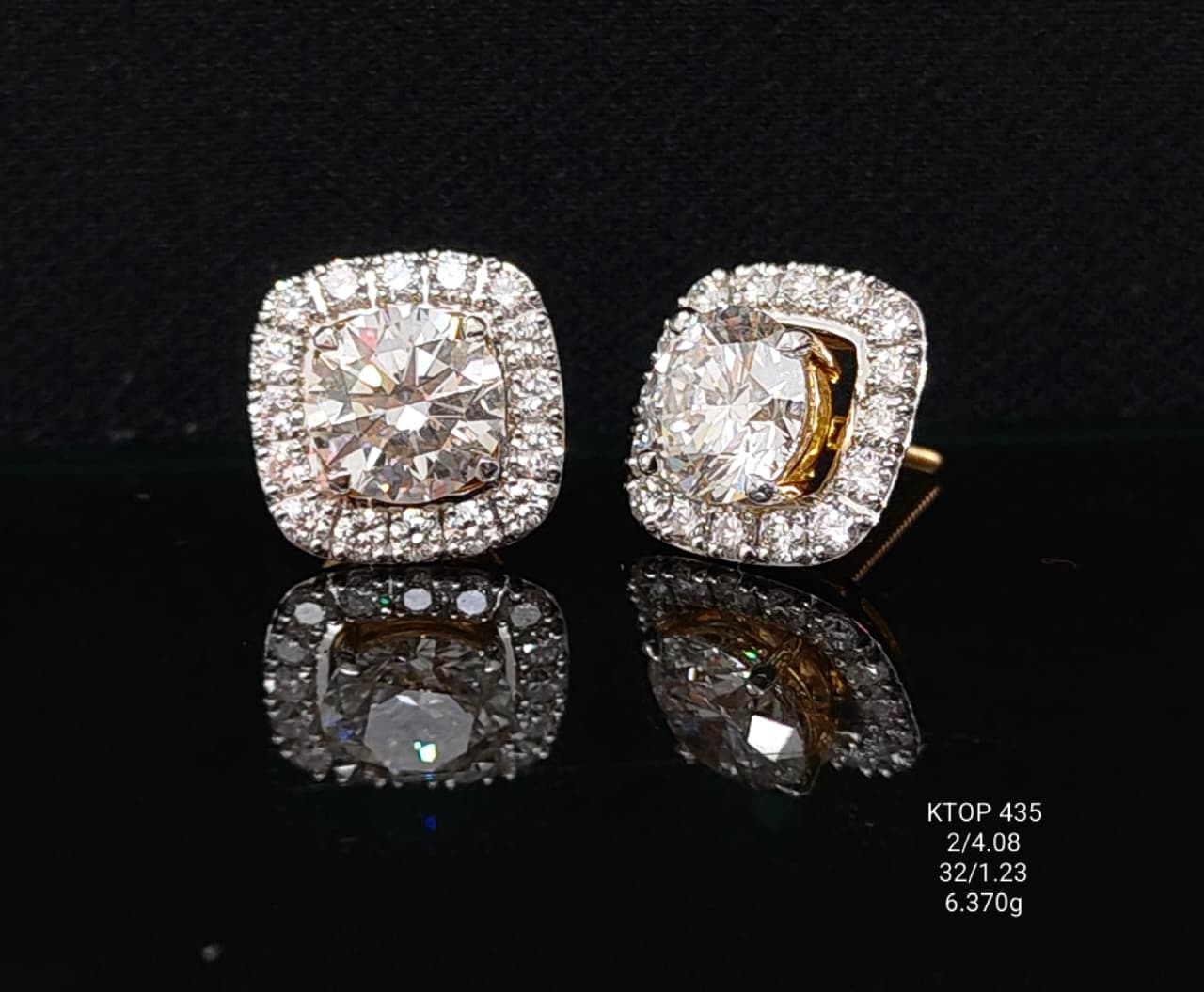 5.31 carat lab-grown diamond earrings in 18kt gold front view
