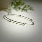 0.273 ct Bangles of 18 KT gold