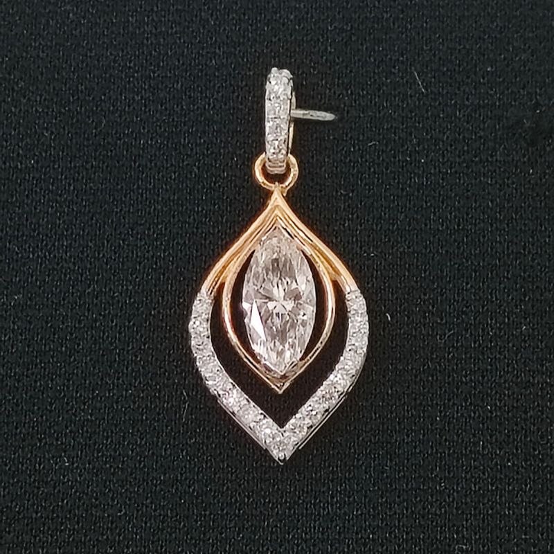 Diamond pendant with gold and silver accents on black background
