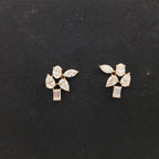 Pair of diamond earrings on a black background