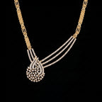 12 carat lab grown diamond paisley necklace in 14K yellow gold: three strands of round diamonds draped to a paisley swirl pendant